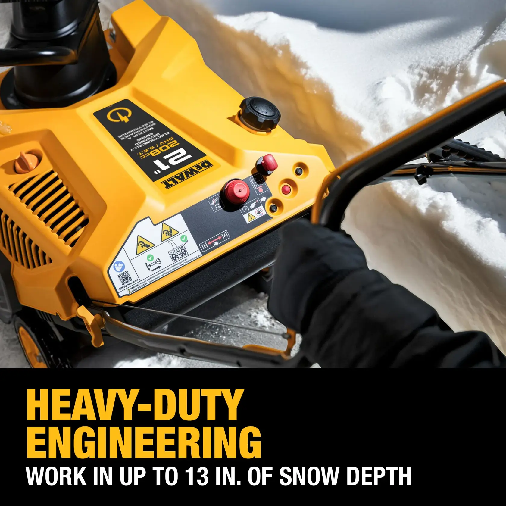 A person operates a DEWALT 21-inch heavy-duty snow blower, clearing a deep path through snow. The yellow and black machine is shown from above, highlighting its control panel and branding. Text on the image reads: 'HEAVY-DUTY ENGINEERING. WORK IN UP TO 13 IN. OF SNOW DEPTH.'