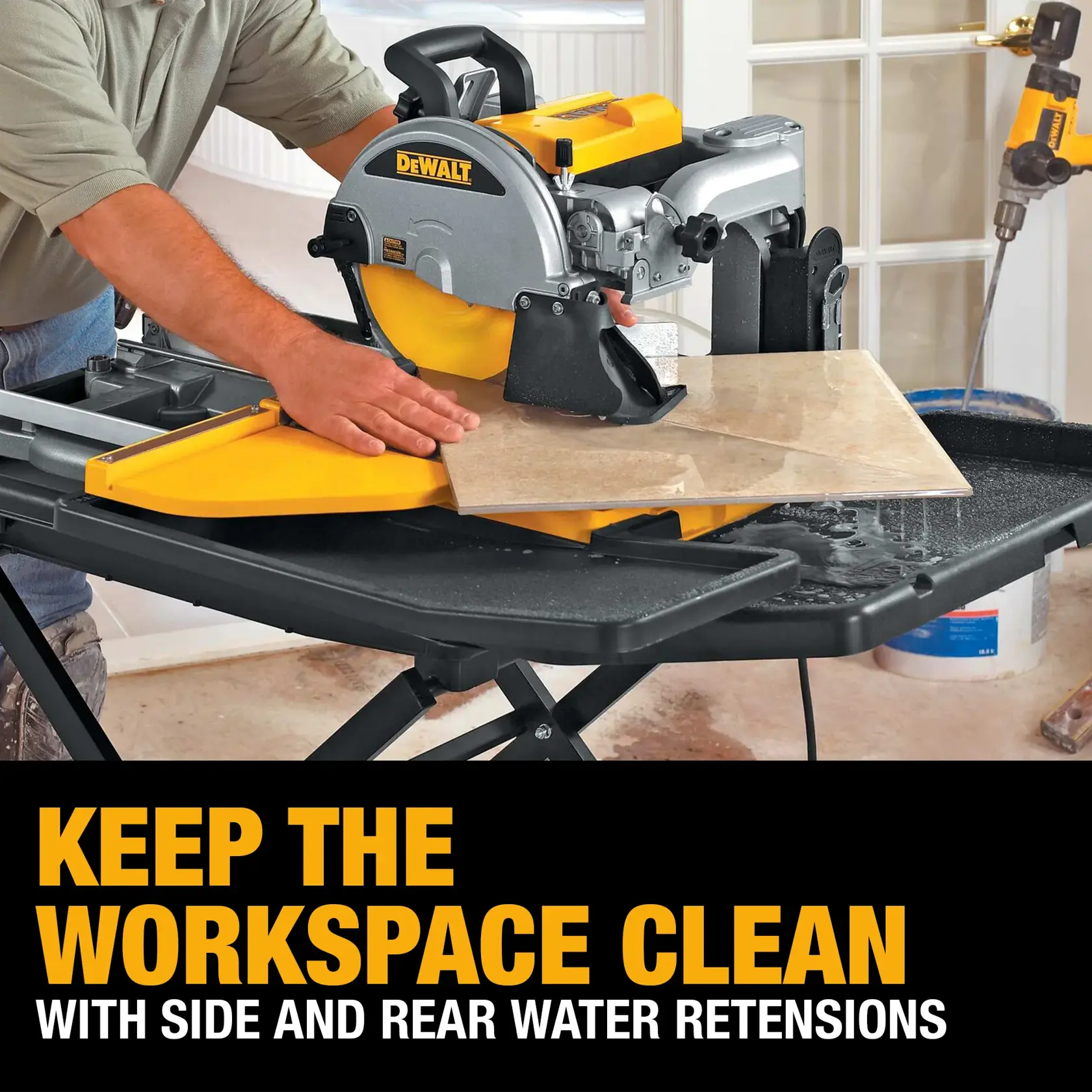 wet tile saw being carried by person on stairs