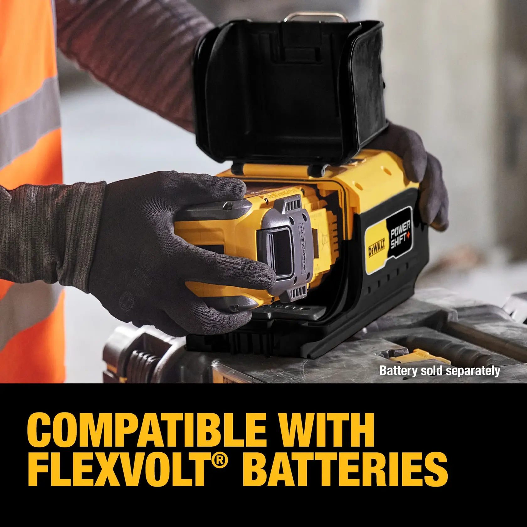 A person wearing gloves inserts a DEWALT FLEXVOLT battery into a DEWALT Power Shift device, with the text 'COMPATIBLE WITH FLEXVOLT BATTERIES' in bold yellow letters at the bottom. The image also notes that the battery is sold separately.