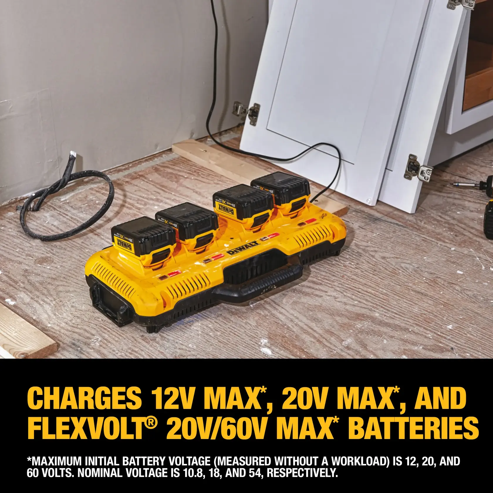Battery being removed from  Multiport Fast Charger by a construction worker