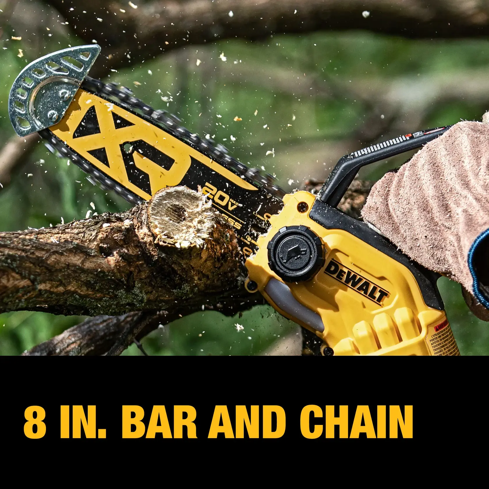 Man cutting branch with DEWALT chainsaw. 8 in. bar and chain.