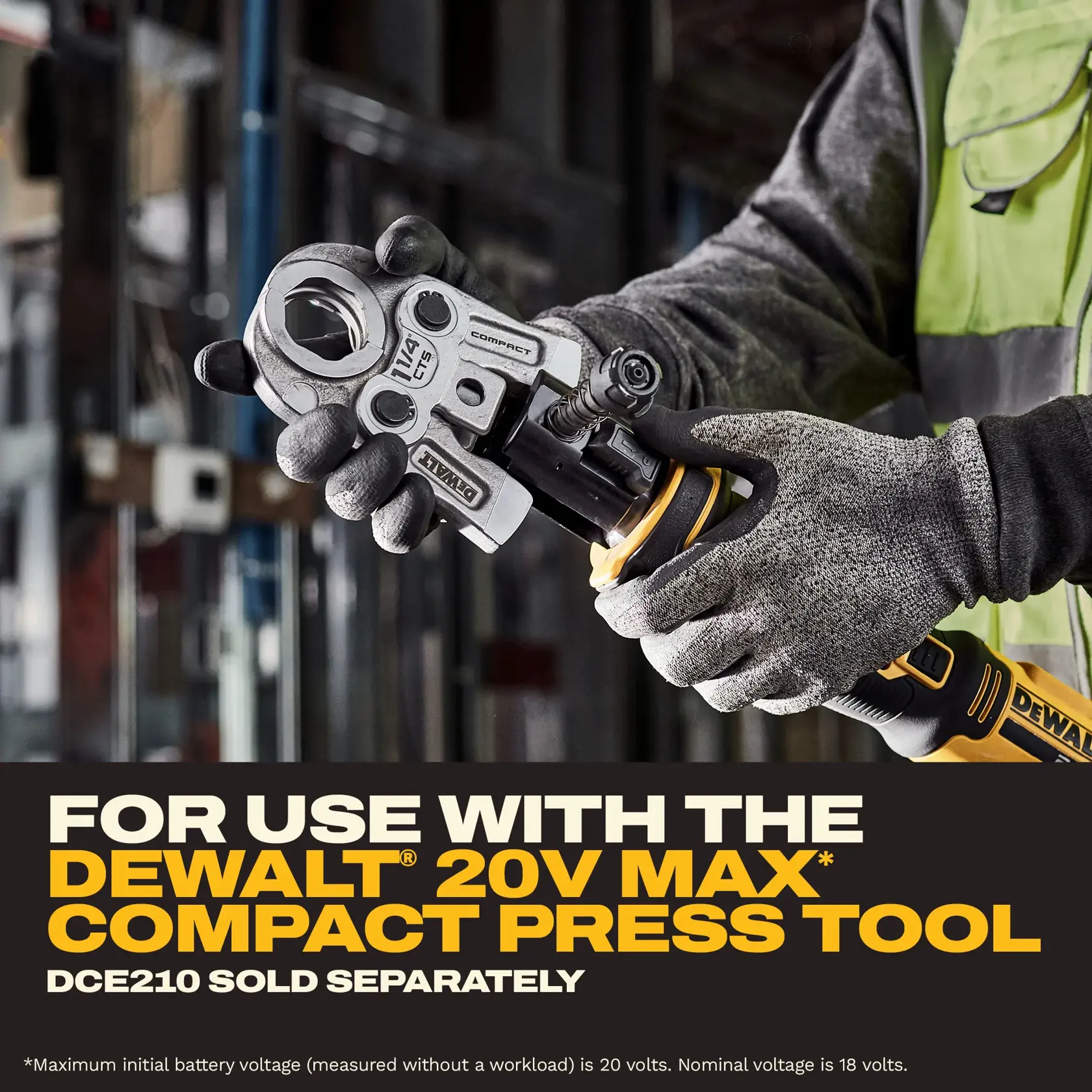 DEWALT press tool held by worker. For use with DCE216012, DCKTS681D1P1. Industrial setting in background.