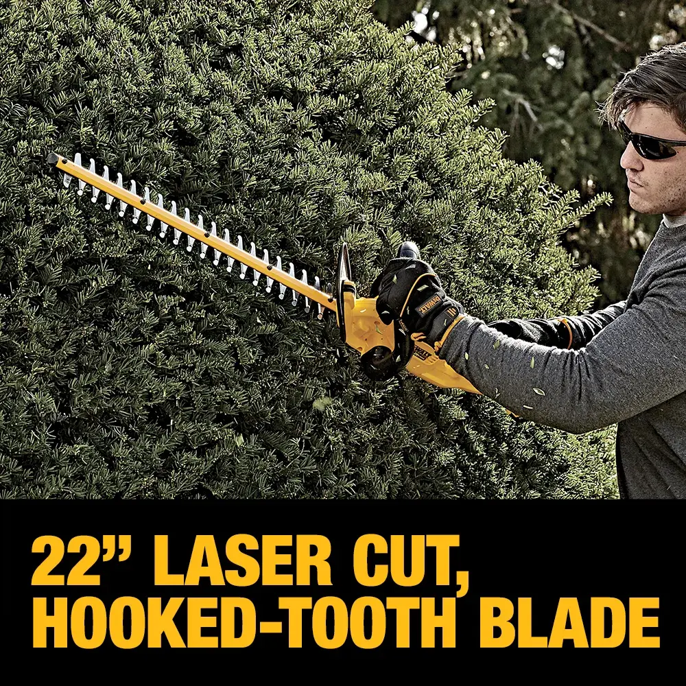 A person wearing gloves is trimming a bush with a DEWALT hedge trimmer featuring a 22-inch laser cut, hooked-tooth blade. The text emphasizes the blade's features.