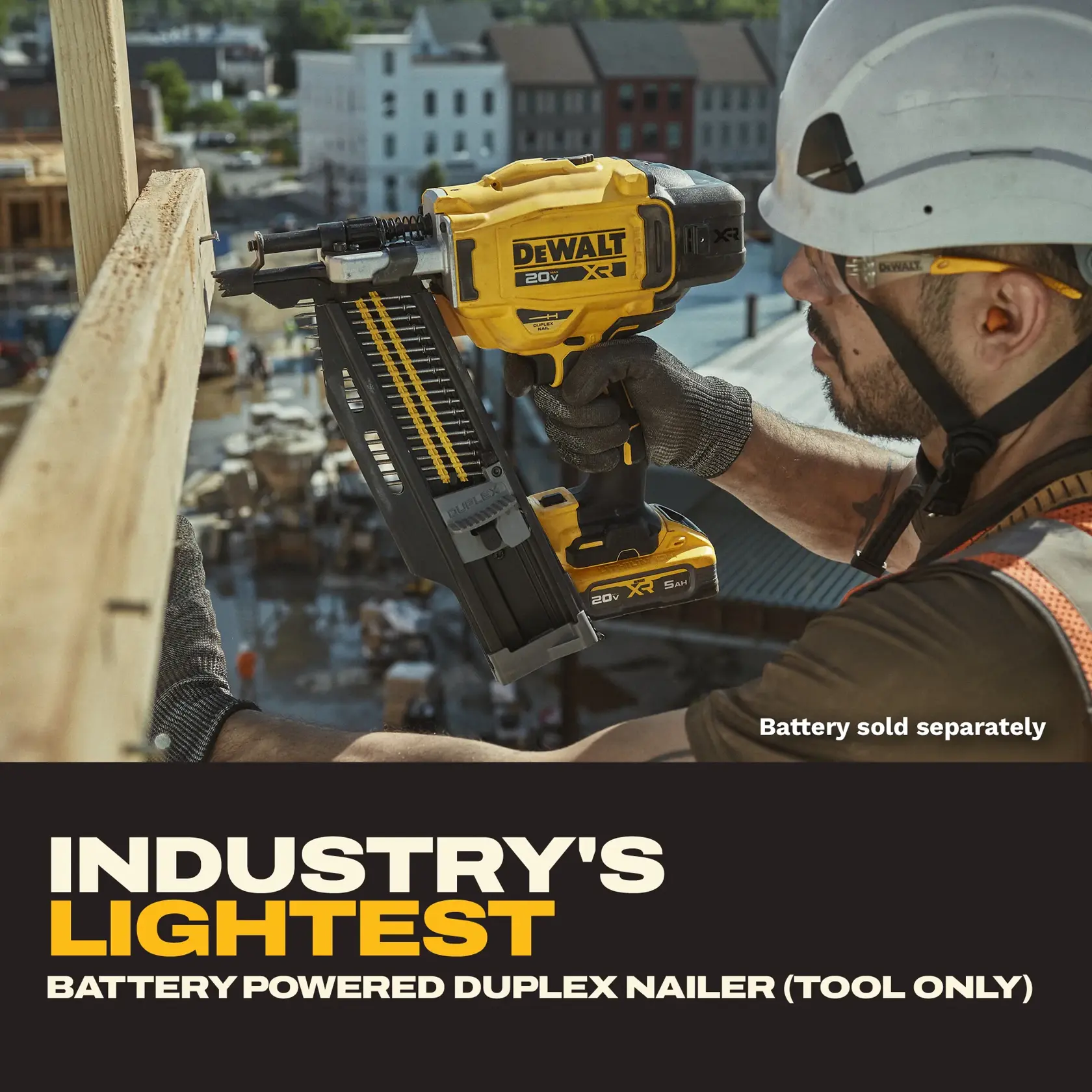 A construction worker uses a yellow DEWALT 20V XR battery-powered duplex nailer to secure a wooden beam at a building site. The tool is shown in close-up, with the background displaying construction equipment and buildings. Text on the image reads: 'Industry's Lightest Battery Powered Duplex Nailer (Tool Only)', indicating the battery is sold separately.