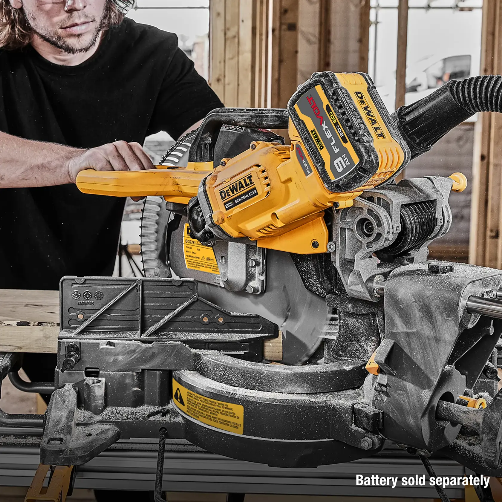 Man using DCS781 Miter Saw with battery sold separately caption