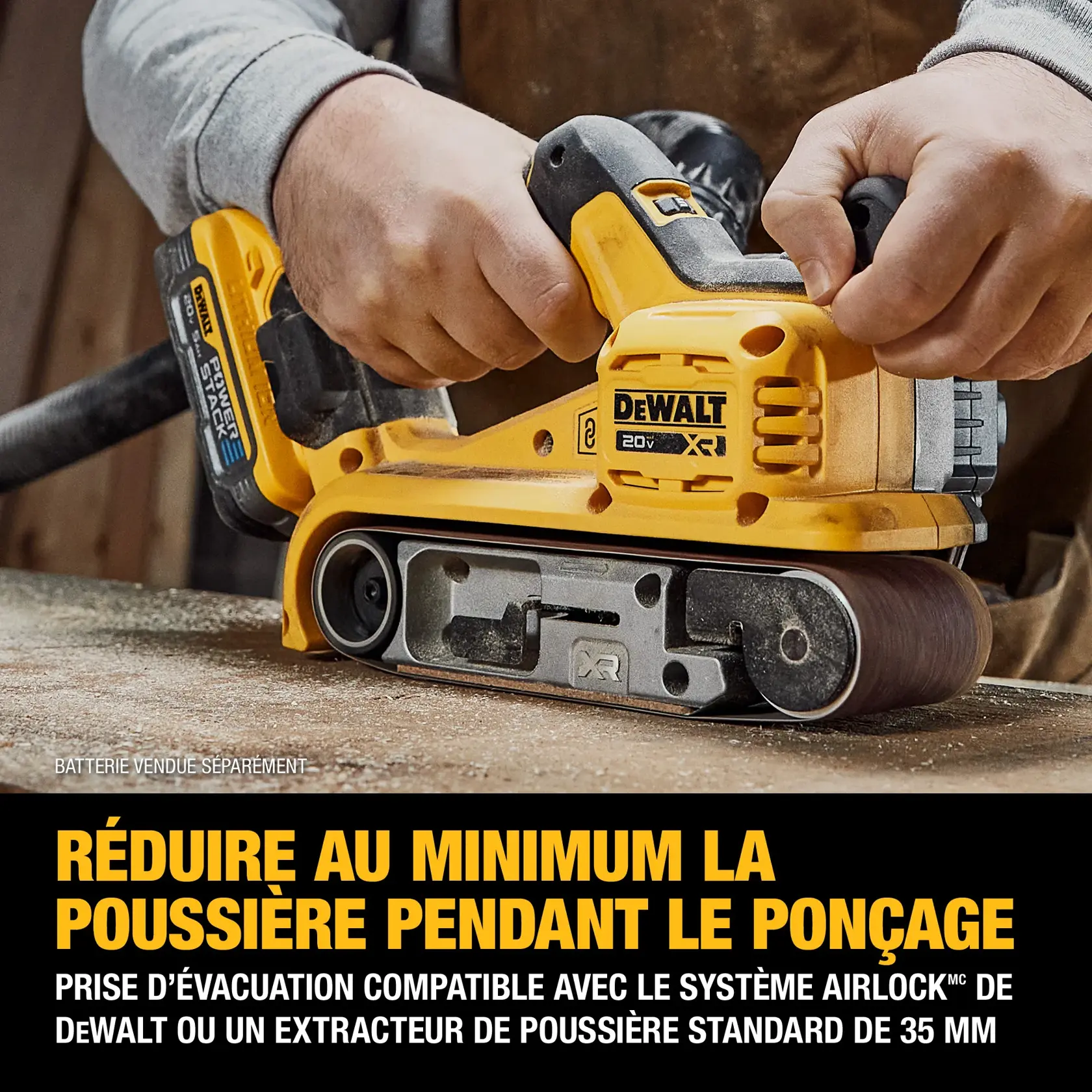 DEWALT cordless belt sander with DEWALT POWERSTACK five amp hour battery hooked up to a dust port