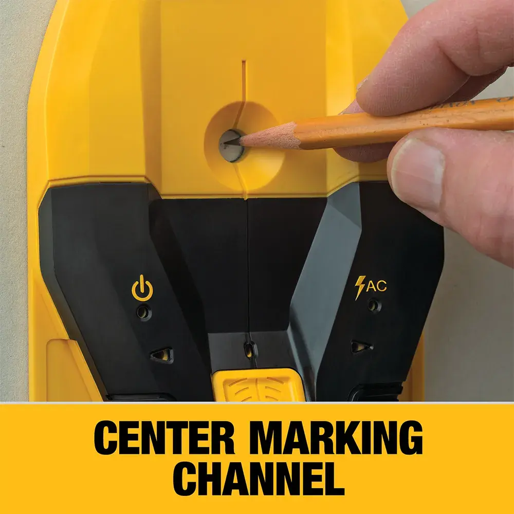 DEWALT stud finder in action against a wall.