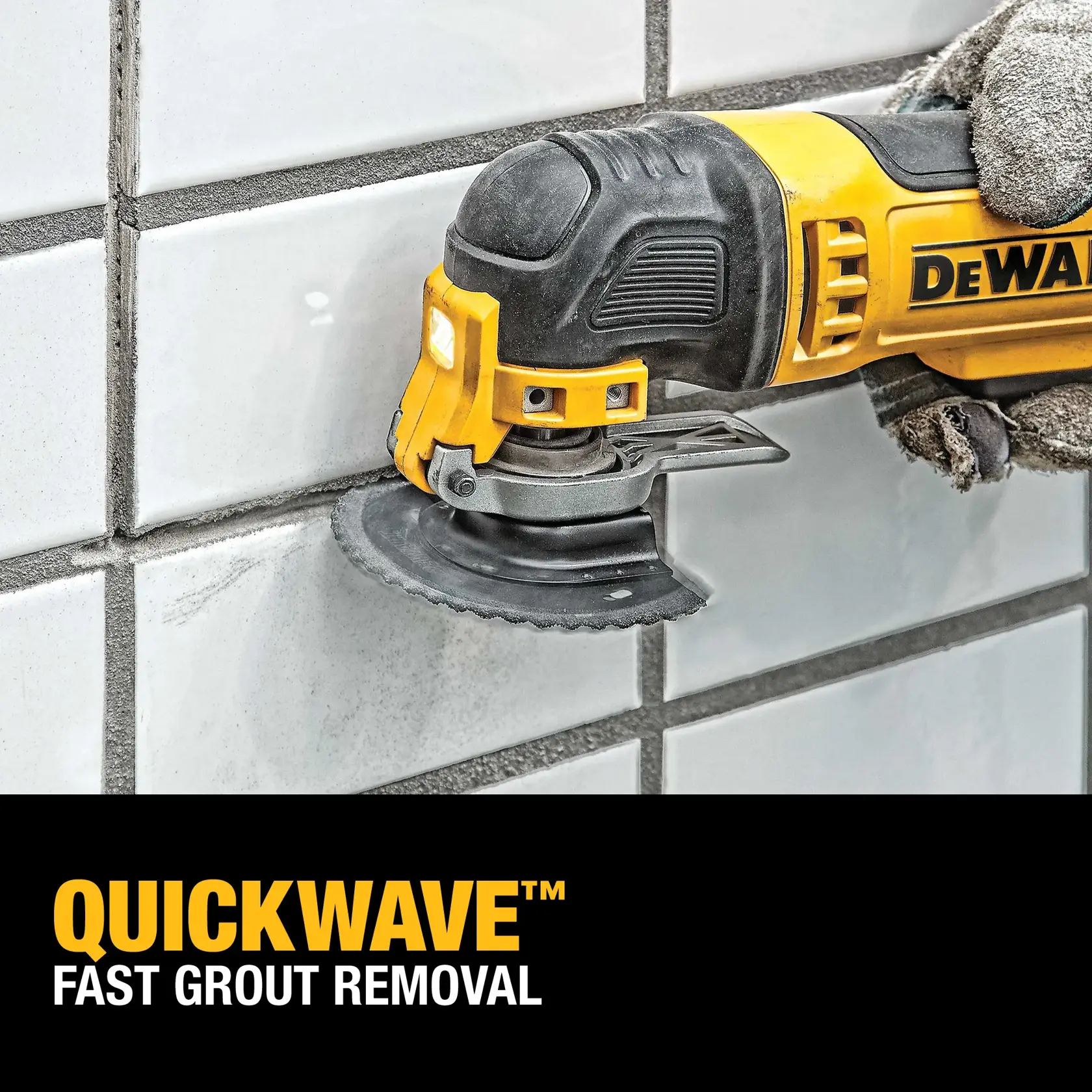 A DEWALT oscillating tool with a Quickwave blade attachment is being used to remove grout from between white tiled surfaces. The tool is held by a gloved hand, and the text below reads 'QUICKWAVE™ FAST GROUT REMOVAL.'