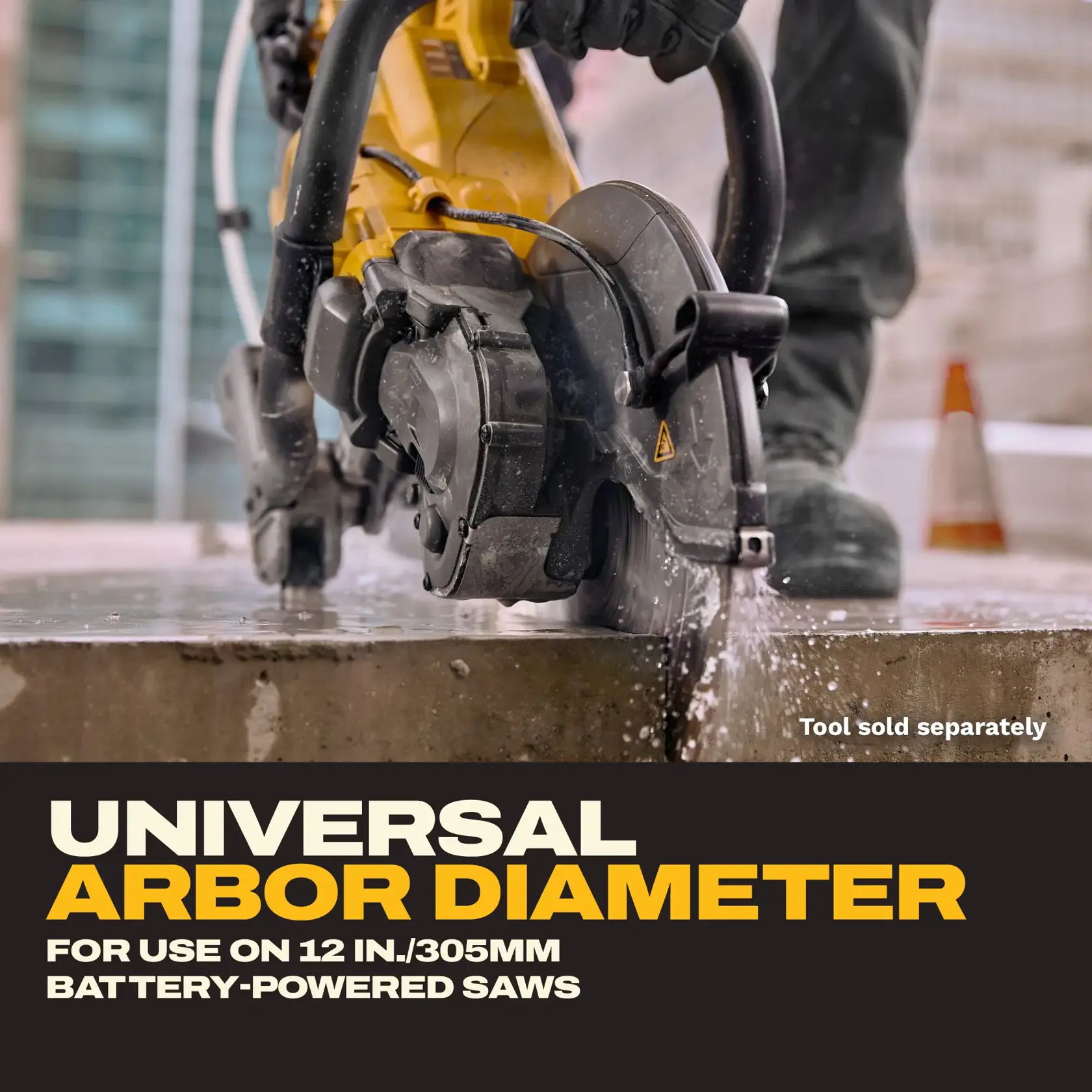 Close-up of a DEWALT saw cutting concrete, suitable for 12 inch battery-powered saws. Tool sold separately.