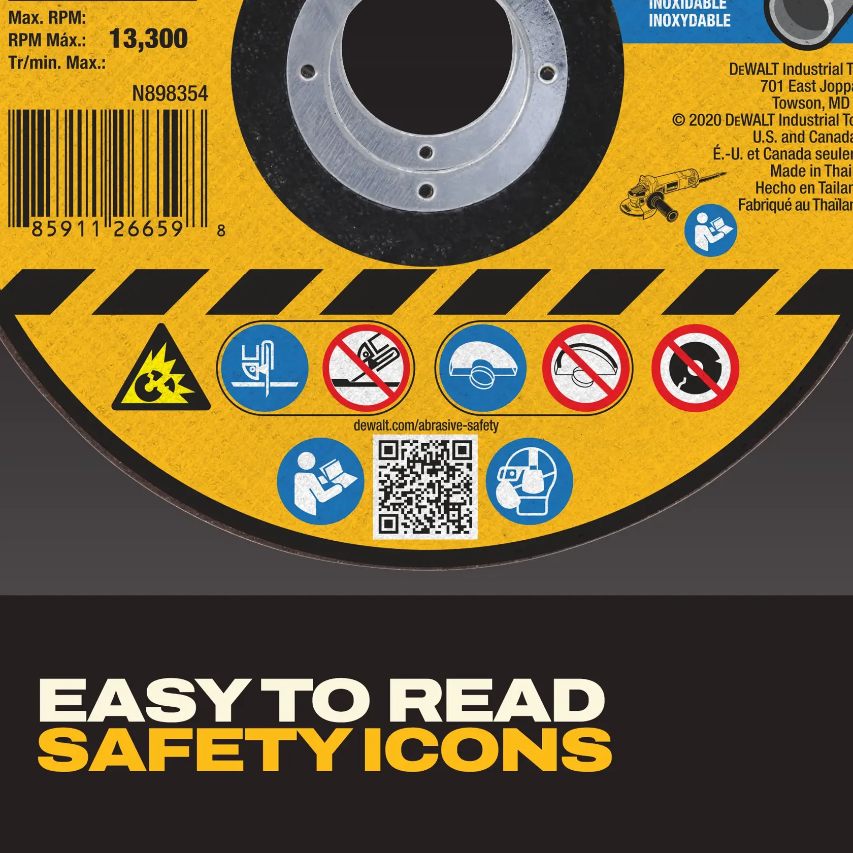 Close-up of a DeWALT grinding or cutting disc label featuring a barcode, max RPM 13,300, several safety icons in blue, red, and yellow indicating usage instructions and warnings, a QR code, and text below that says 'Easy to read safety icons.'