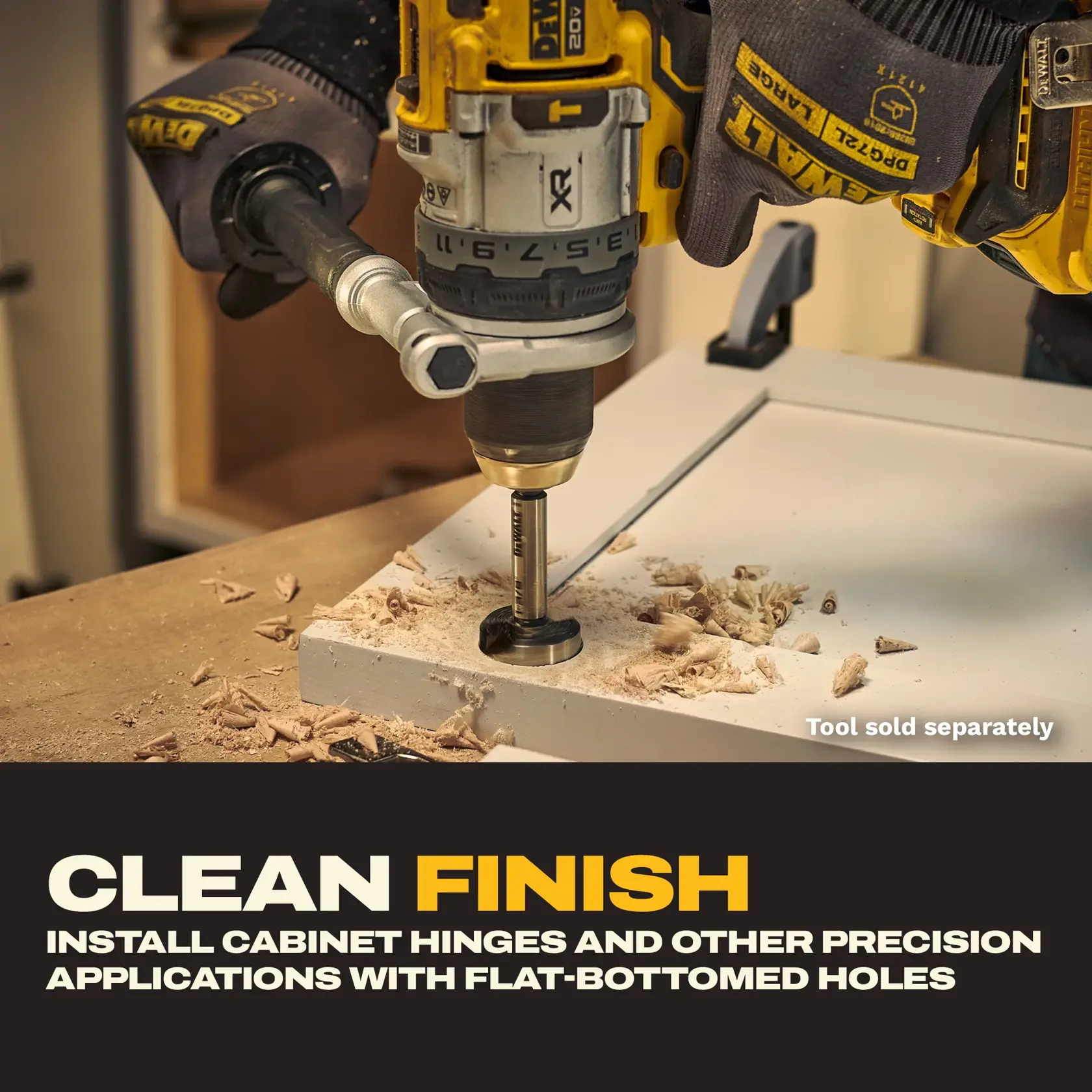 A person wearing DEWALT gloves uses a yellow DEWALT drill equipped with a Forstner bit to drill a flat-bottomed hole into a white cabinet panel. Wood shavings are scattered around the drilled area. The image features text stating 'Clean Finish: Install cabinet hinges and other precision applications with flat-bottomed holes.' There is a small note indicating 'Tool sold separately.'