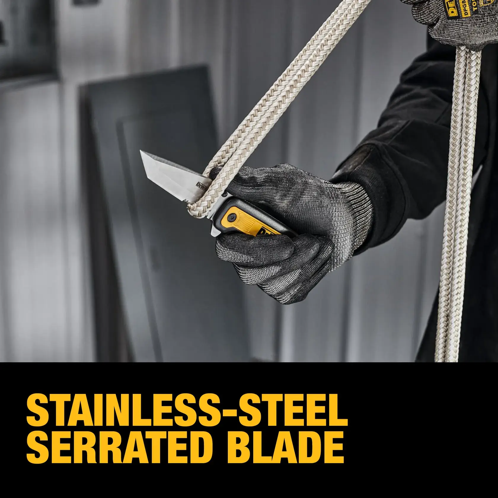 End user cutting rope with DEWALT® DWHT10994 Tanto Pocket Knife using serrated edge graphic