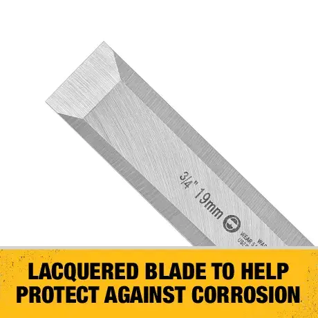 3 quarters inch Wood Chisel being struck with hammer by worker to scrape wooden log surface at worksite.