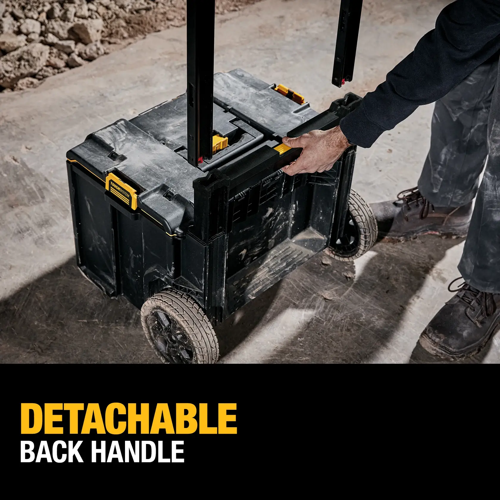 Handle of tough system 2.0 rolling toolbox being adjusted at a worksite.