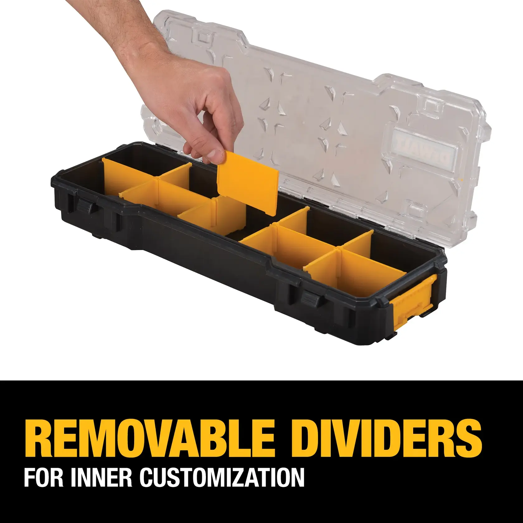 Removable dividers of a 10 compartment pro organizer being adjusted.