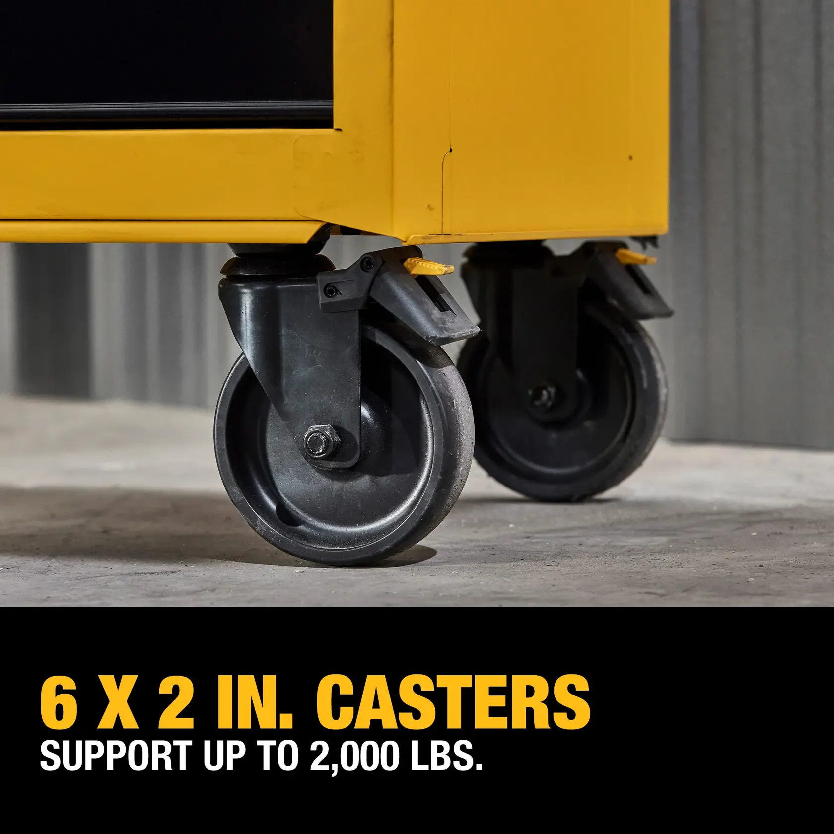 Demonstrating 6 X 2 inch Casters on the DEWALT® 37 in. 5-Drawer Rolling Tool Cabinet