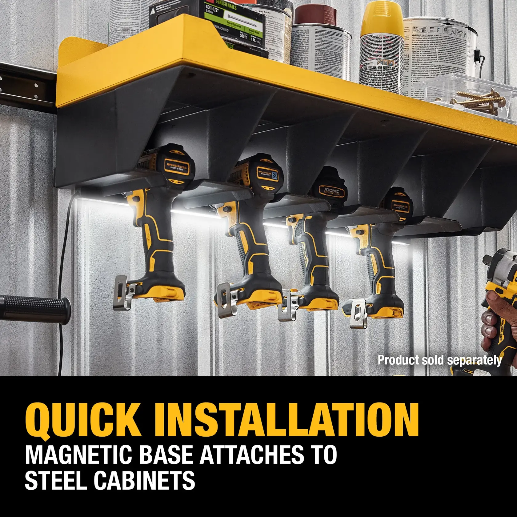 A yellow and black DEWALT magnetic base tool holder is mounted under a shelf in a workshop, holding four cordless drills, with cans and hardware stored on the shelf above. Text reads: 'Quick Installation: Magnetic base attaches to steel cabinets.'