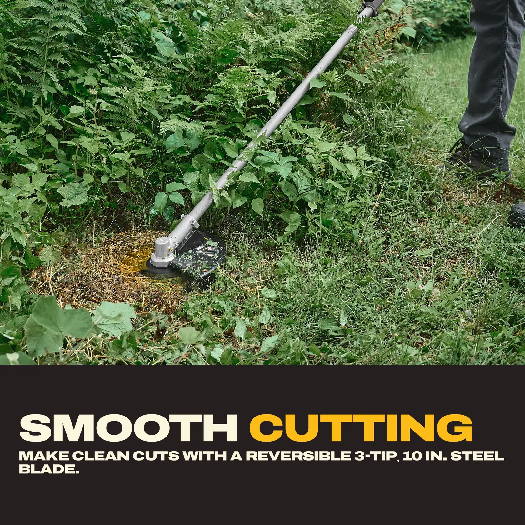 Trimmer cutting thick grass and weeds with a reversible 3-tip, 10 inch steel blade. Foot visible beside tool.