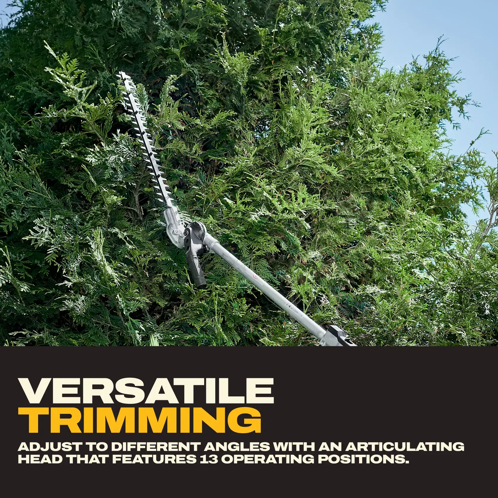 Hedge trimmer with adjustable head trims tall green bushes, showing versatile positioning for cutting.
