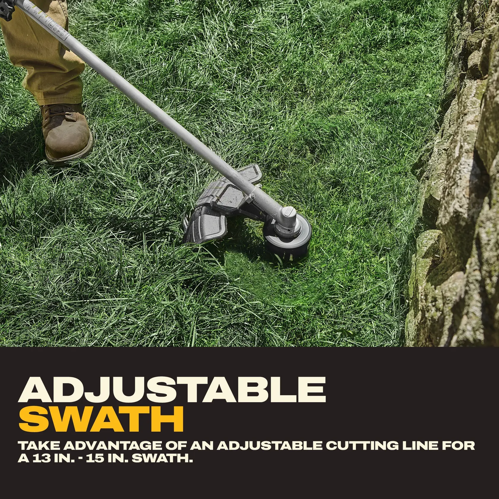 Person using a DEWALT trimmer with adjustable cutting swath on grass near a stone wall.