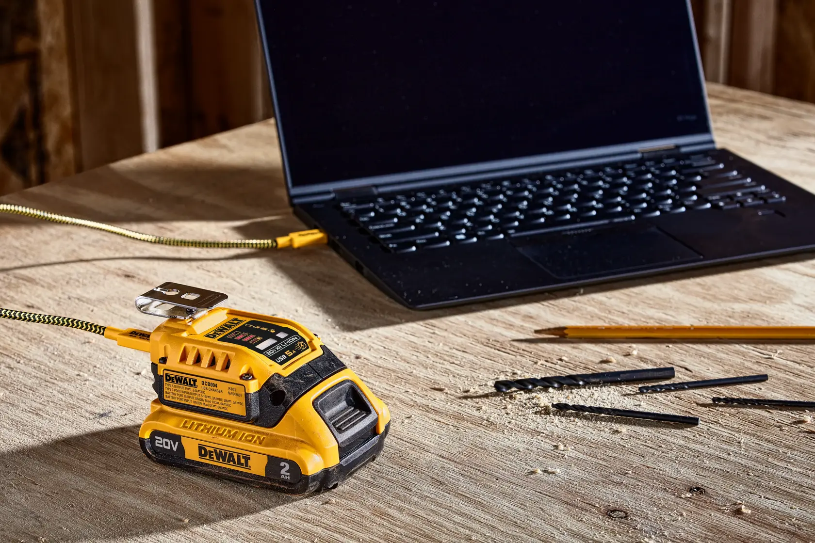 charger plugged into a DEWALT wall plug