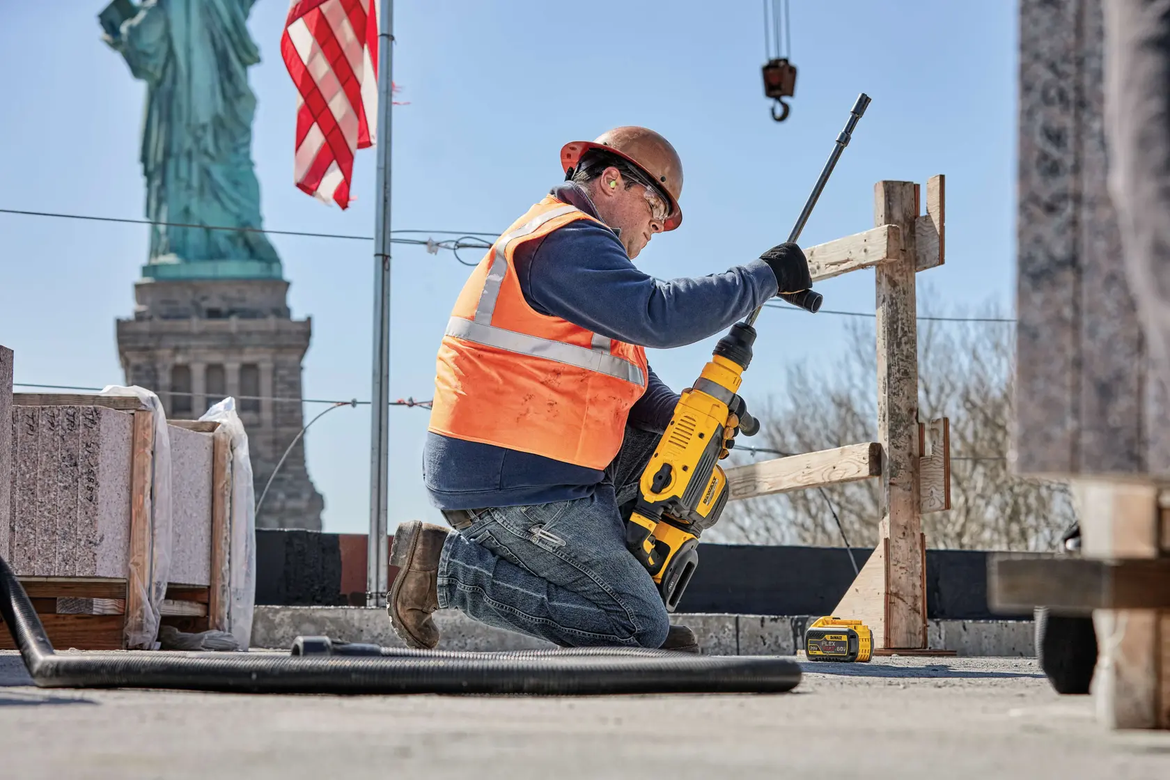 20 Volt to 60 Volt 12 AMP hours Battery-powered Road Drill being used by a construction worker to drill a hole at a construction site