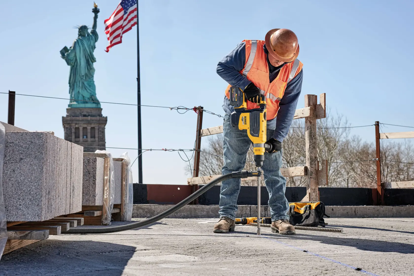 20 Volt to 60 Volt 12 AMP hours Battery-powered Road Drill being used by a construction worker to drill a hole at a construction site