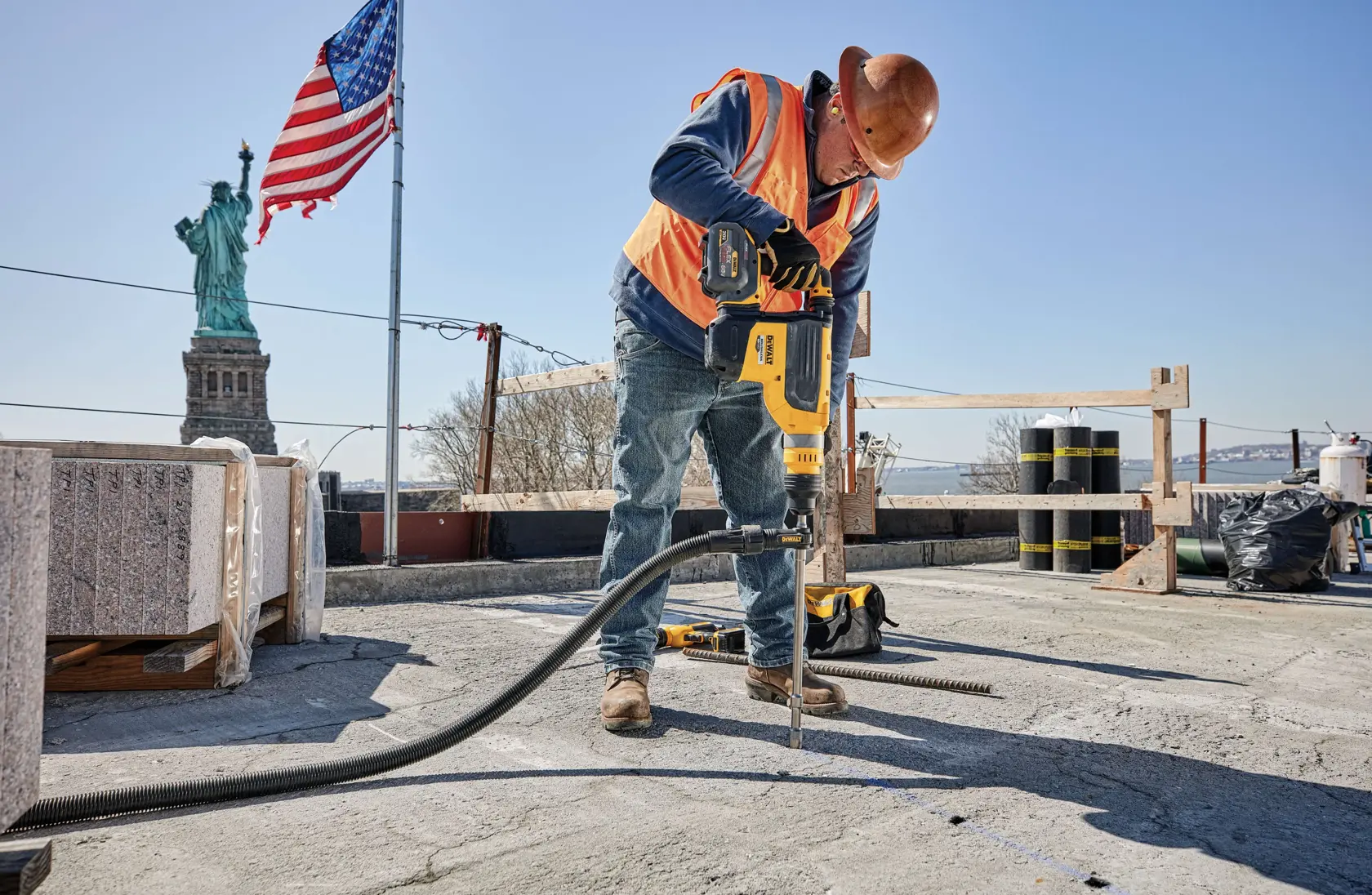 20 Volt to 60 Volt 12 AMP hours Lithium Ion Battery powered Circular Saw being used by a construction worker to cut concrete at a construction site