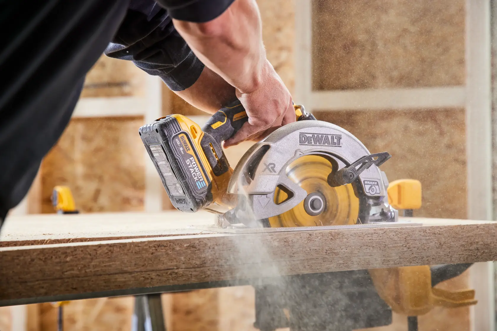 Circular saw cutting triple stack OSB with DEWALT POWERSTACK five amp hour battery 