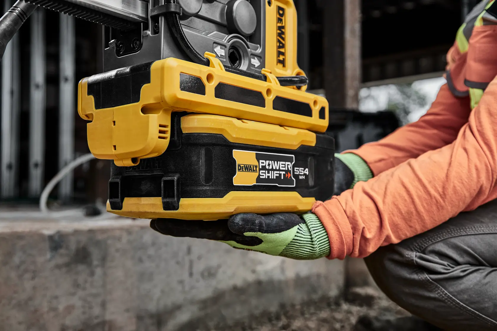 Man holding core drill at battery 