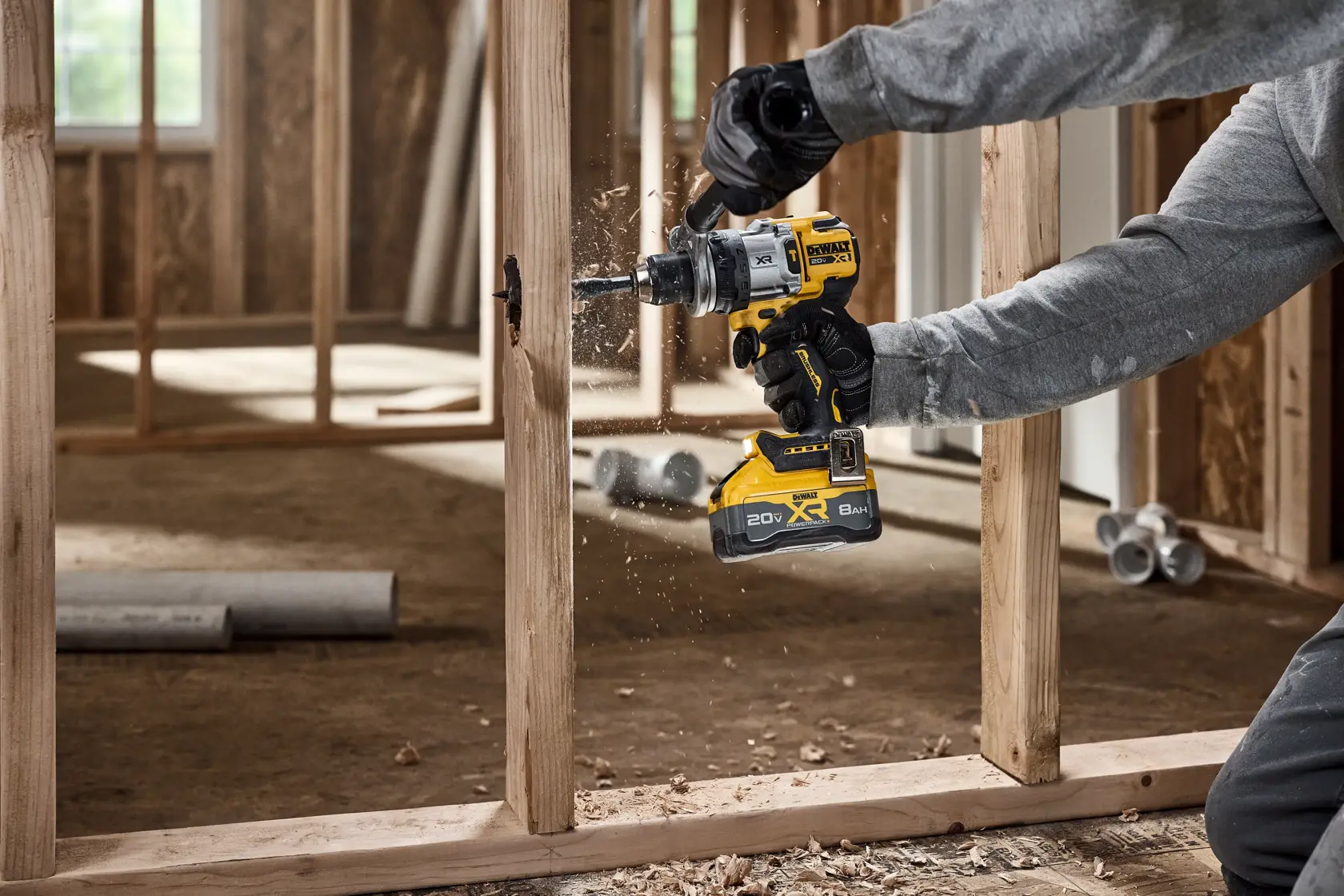 20V MAX* XR® Brushless Cordless 1/2 in. Hammer Drill drilling 2-9/16“ hole for plumbing 