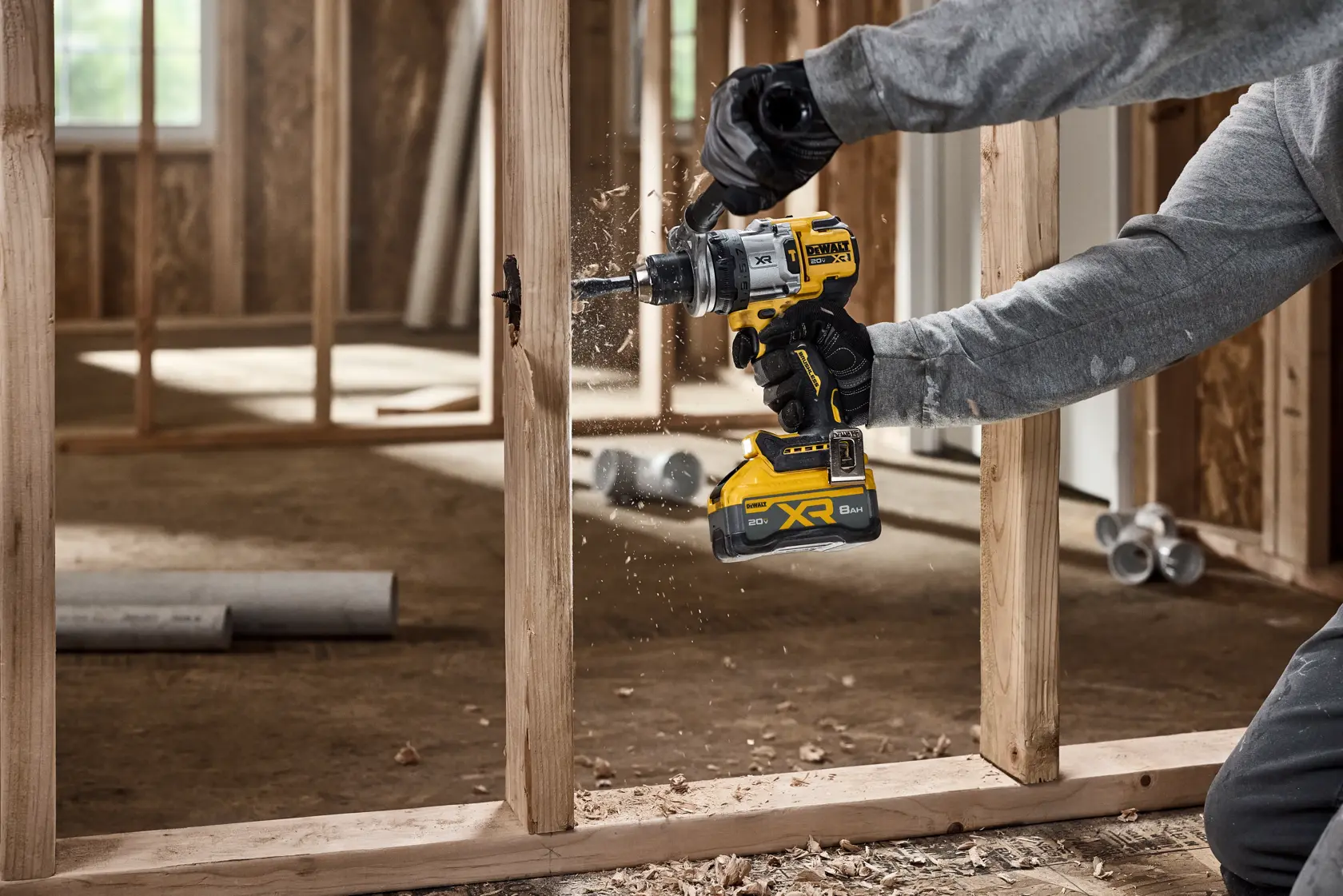 20V MAX* XR® Brushless Cordless 1/2 in. Hammer Drill drilling 2-9/16“ hole for plumbing 