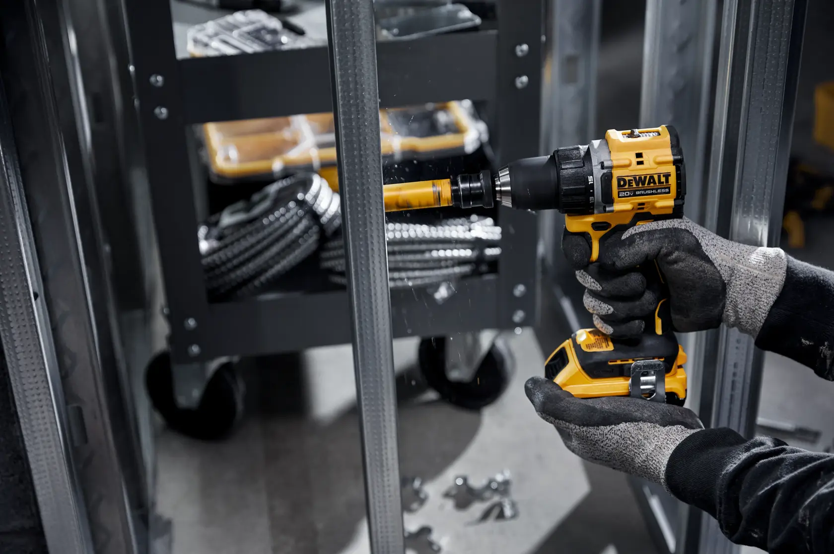 ATOMIC COMPACT SERIES(™)20V MAX Brushless Drill/Driver drilling into metal