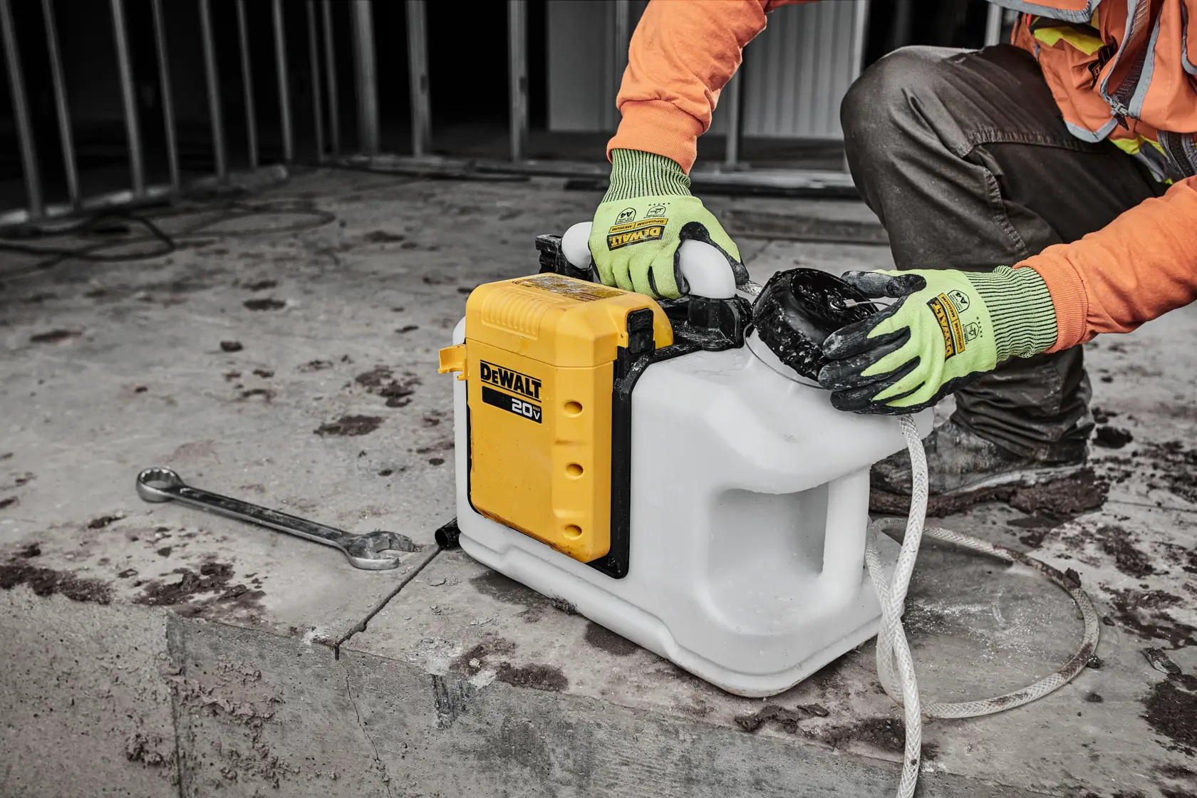 Man opening up lid to water tank