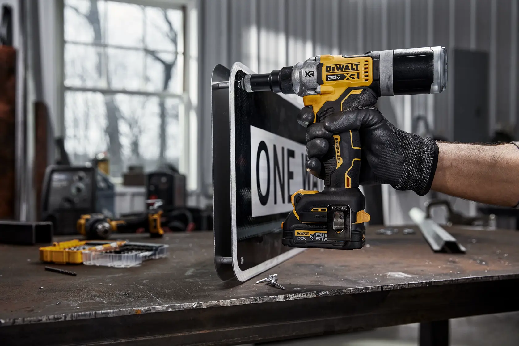 DEWALT 20V MAX* XR® 1/4 InchesRivet Tool street sign application image 
