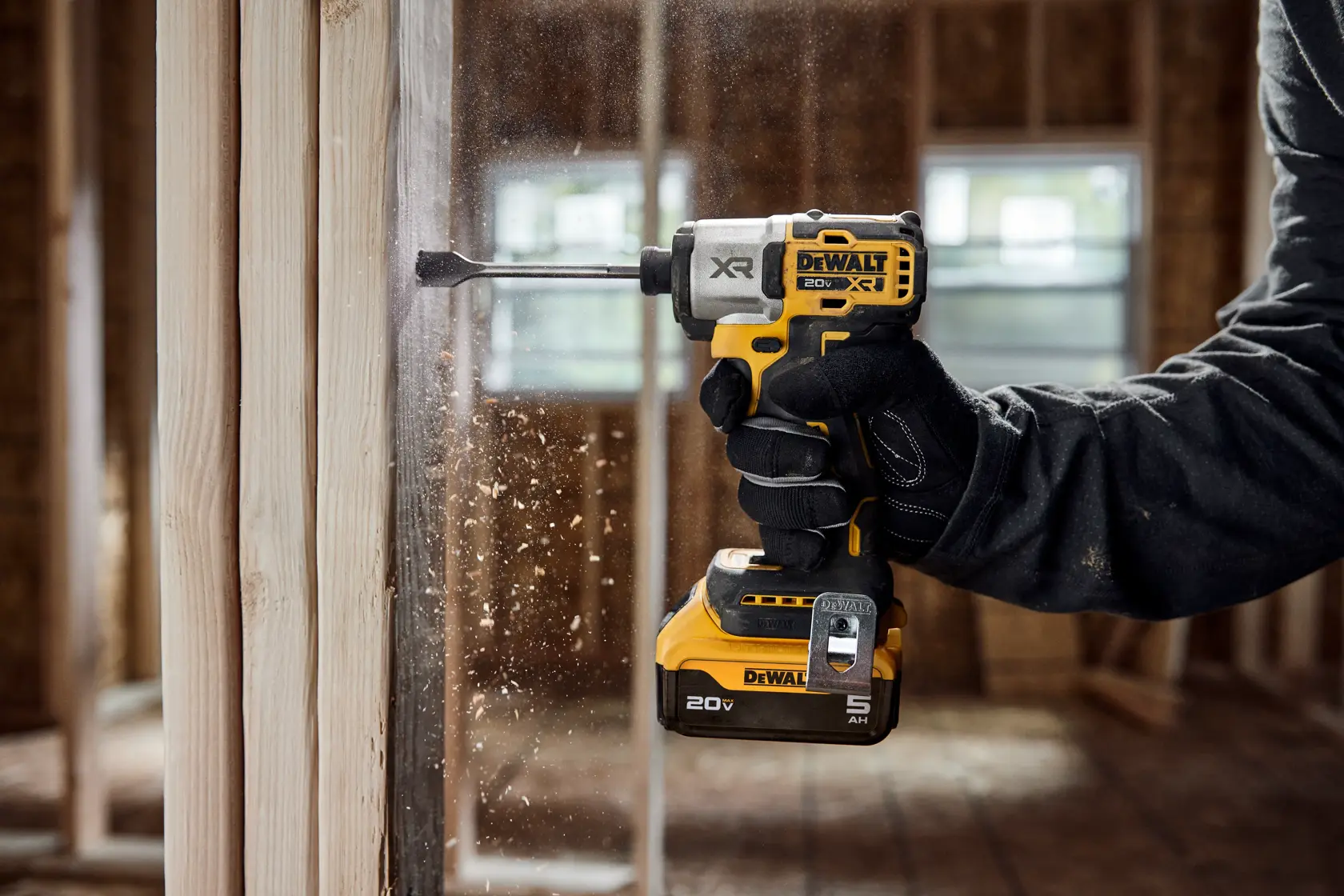 DCF845 20V MAX 1/4 inch 3-Speed Impact Driver drilling a hole into wood