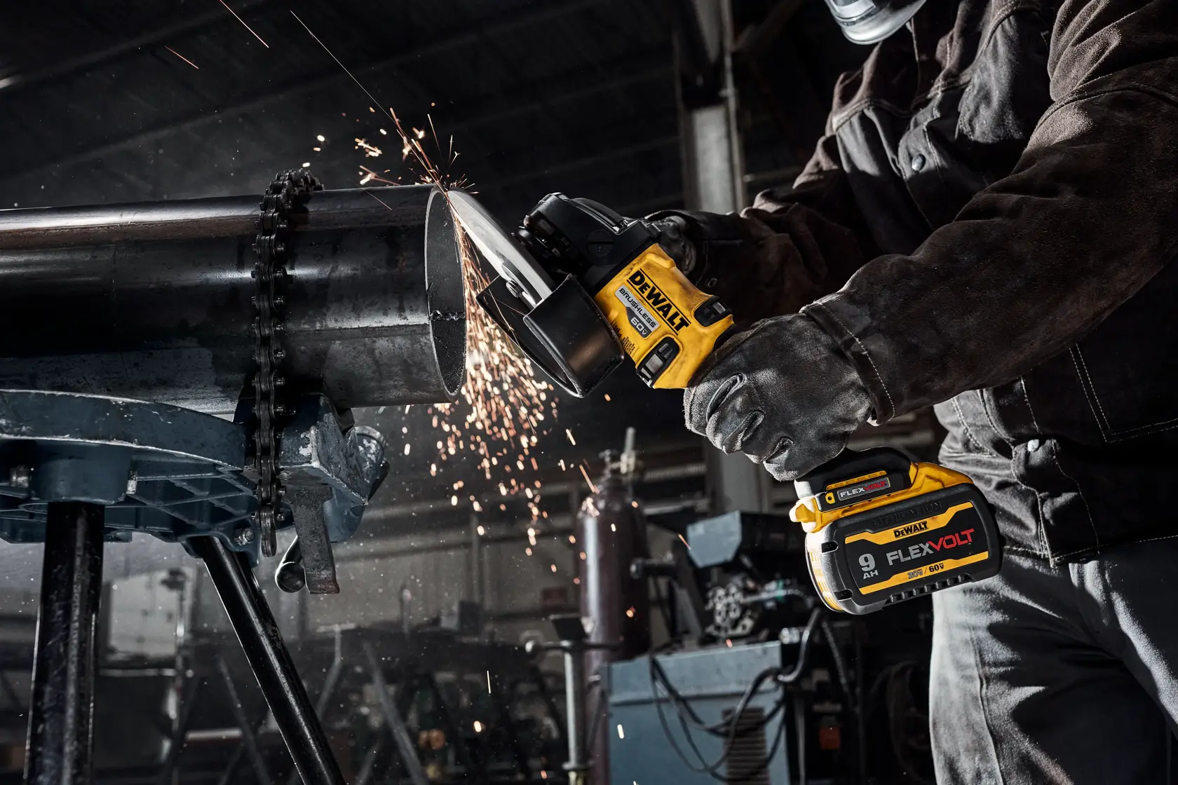 7 INCH BRUSHLESS CORDLESS GRINDER WITH KICK BACK BRAKE being used on metal pipe.