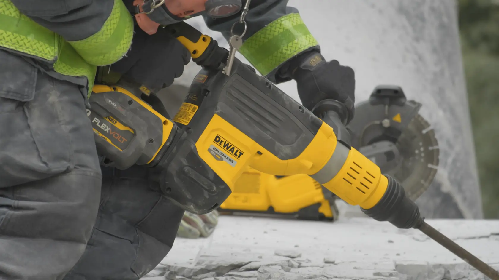 Image of Fire Fighter holding DeWalt 2 In Brushless Cordless Combination Rotary Hammer