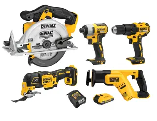A DEWALT DCK540D1 photography product set featuring five cordless power tools, including a circular saw, impact driver, drill, multi-tool, and reciprocating saw, along with a battery and charger. All tools are colored yellow and black.