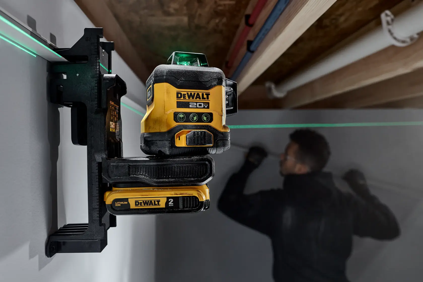 DEWALT 20V MAX 3x360 Green Line Laser mounted on wood frame to help user mark placement of electrical box