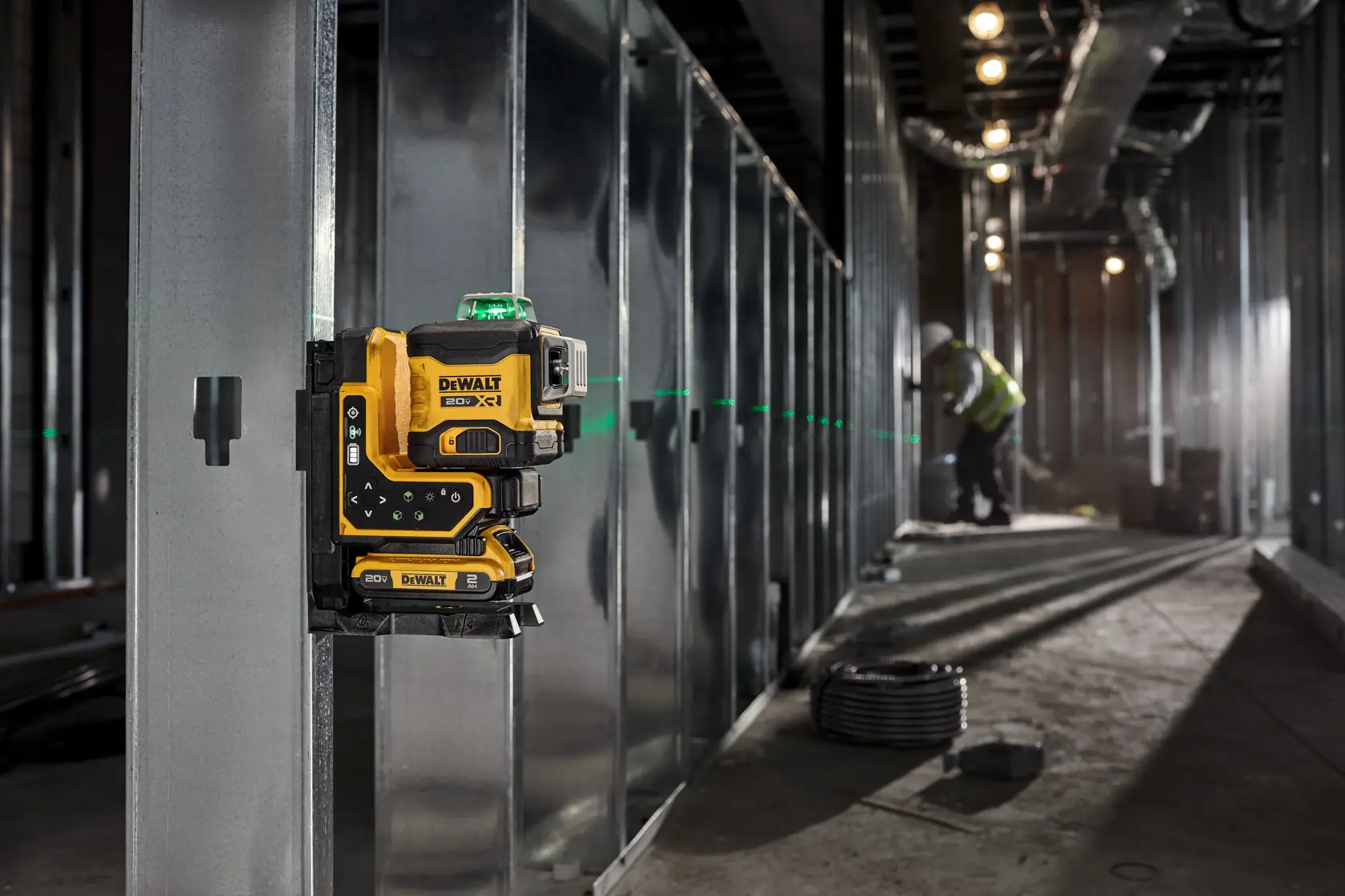 Someone laying walling using the 20V MAX* XR® Remote Control 360º Line Laser