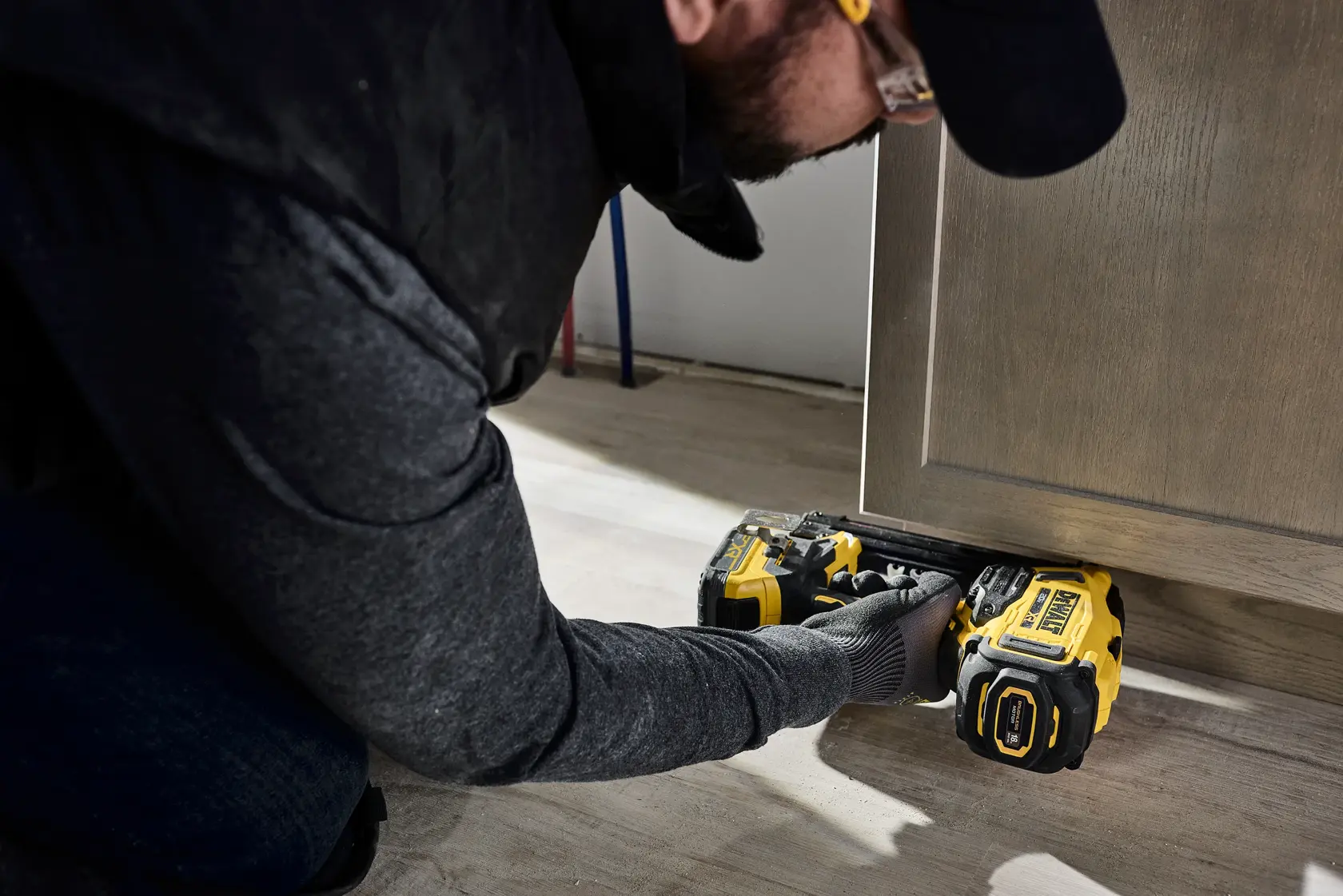 Nailer nailing in tight space under cabinets