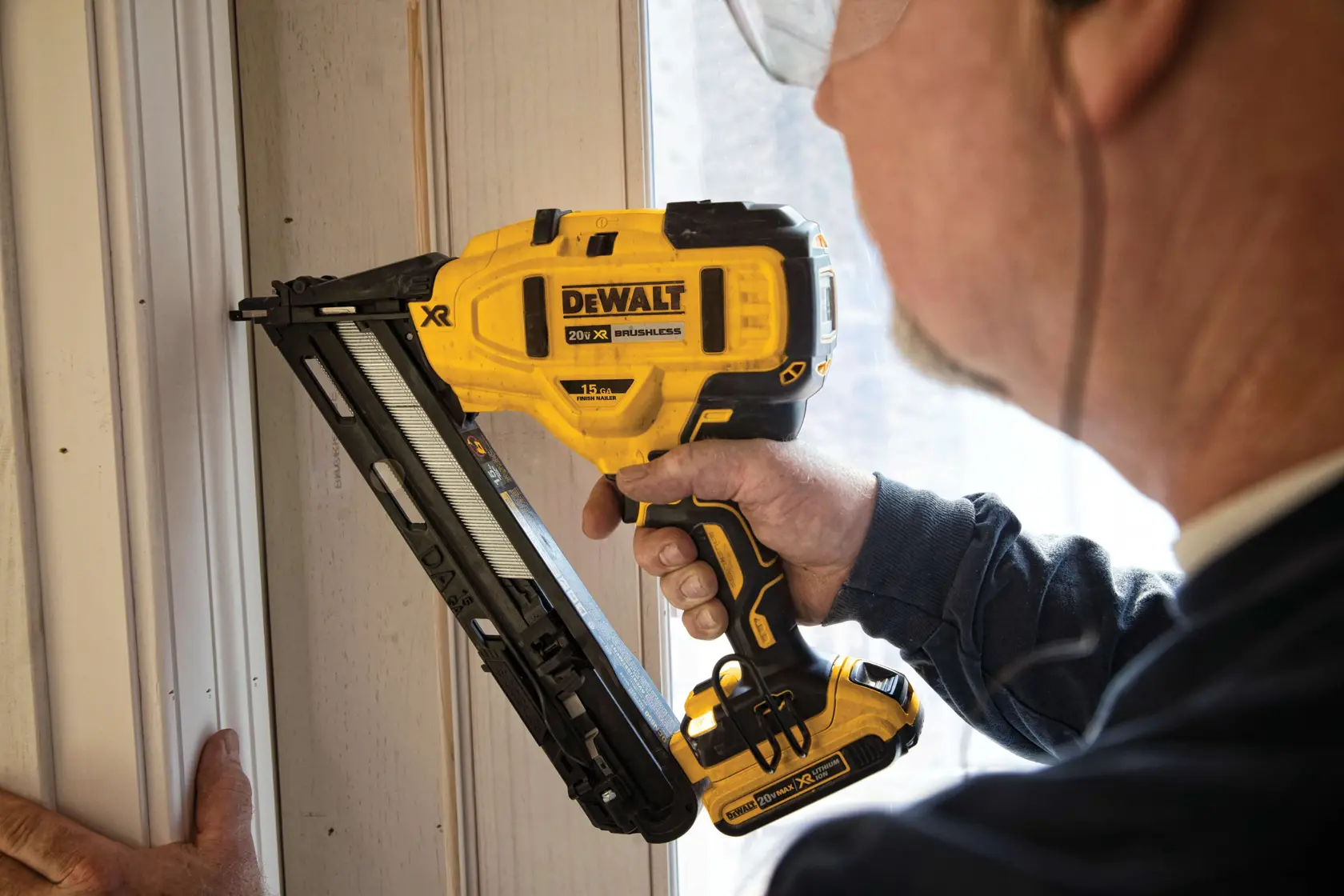 XR Cordless 15 Gauge Angled Finish Nailer in action on a door frame