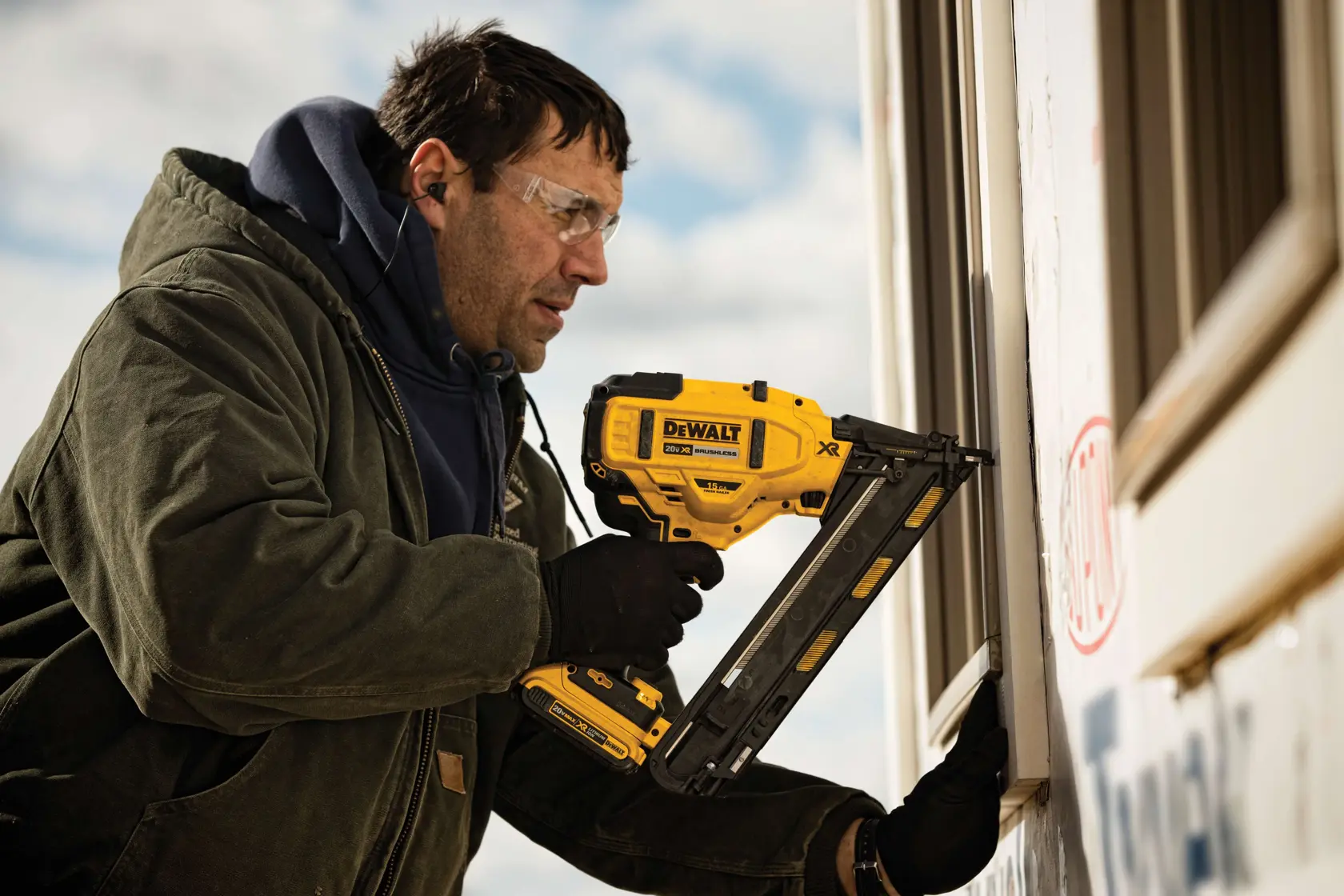 XR Cordless 15 Gauge Angled Finish Nailer in action on a wall by a construction worker