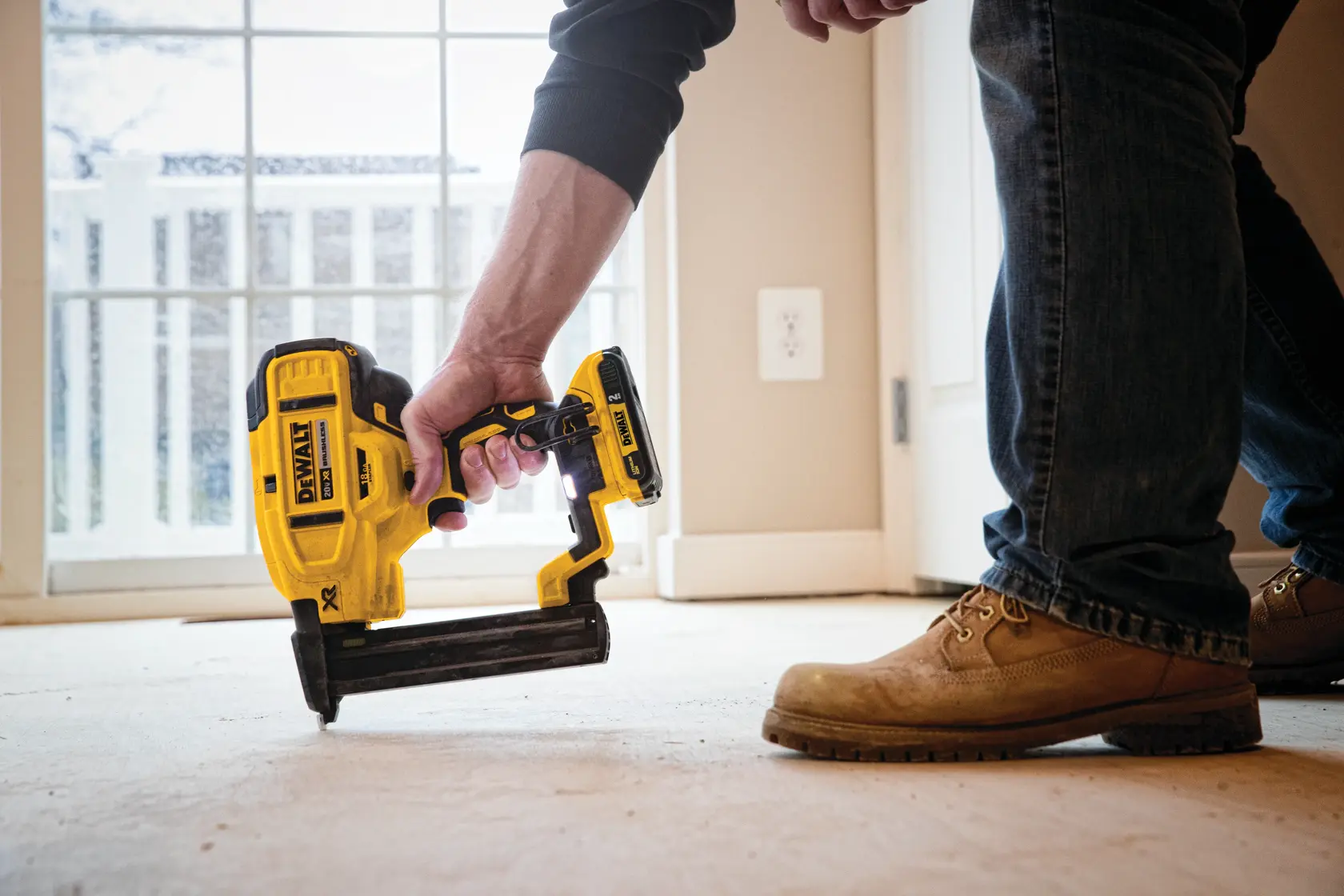 XR 18 GA Cordless Narrow Crown Stapler in action on the floor