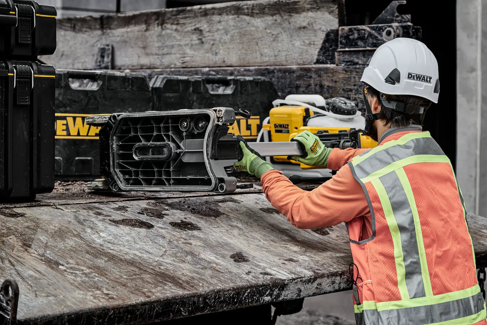 Man putting stand in truck