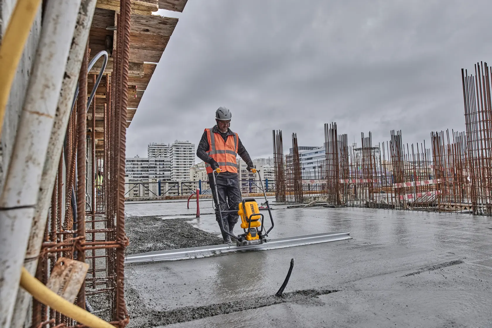 Man operating screed