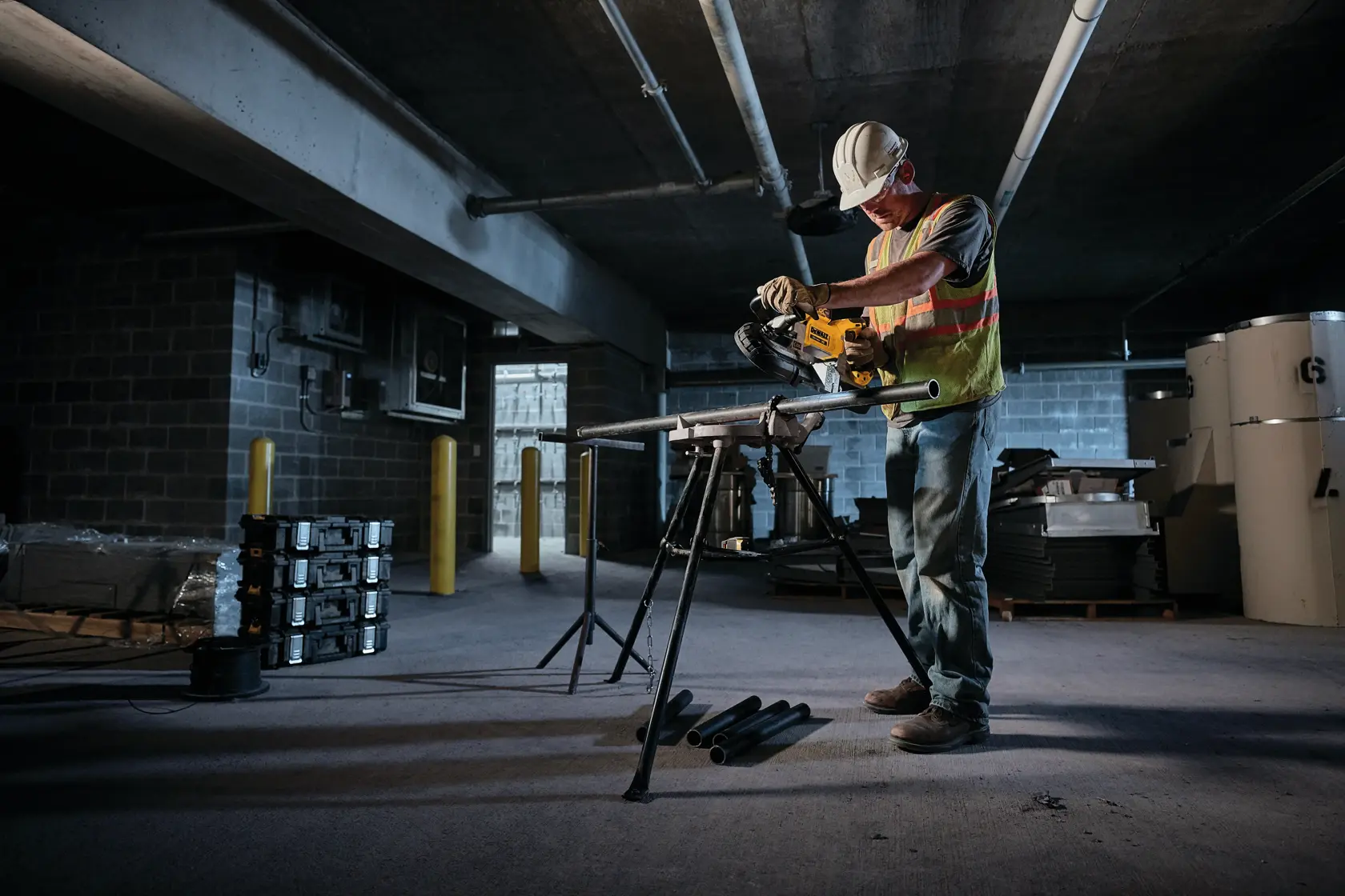 5 inch Dual Switch Band Saw being used by worker to cut metal pipe at worksite