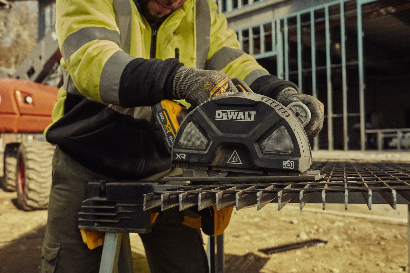 Man cutting with metal circular saw