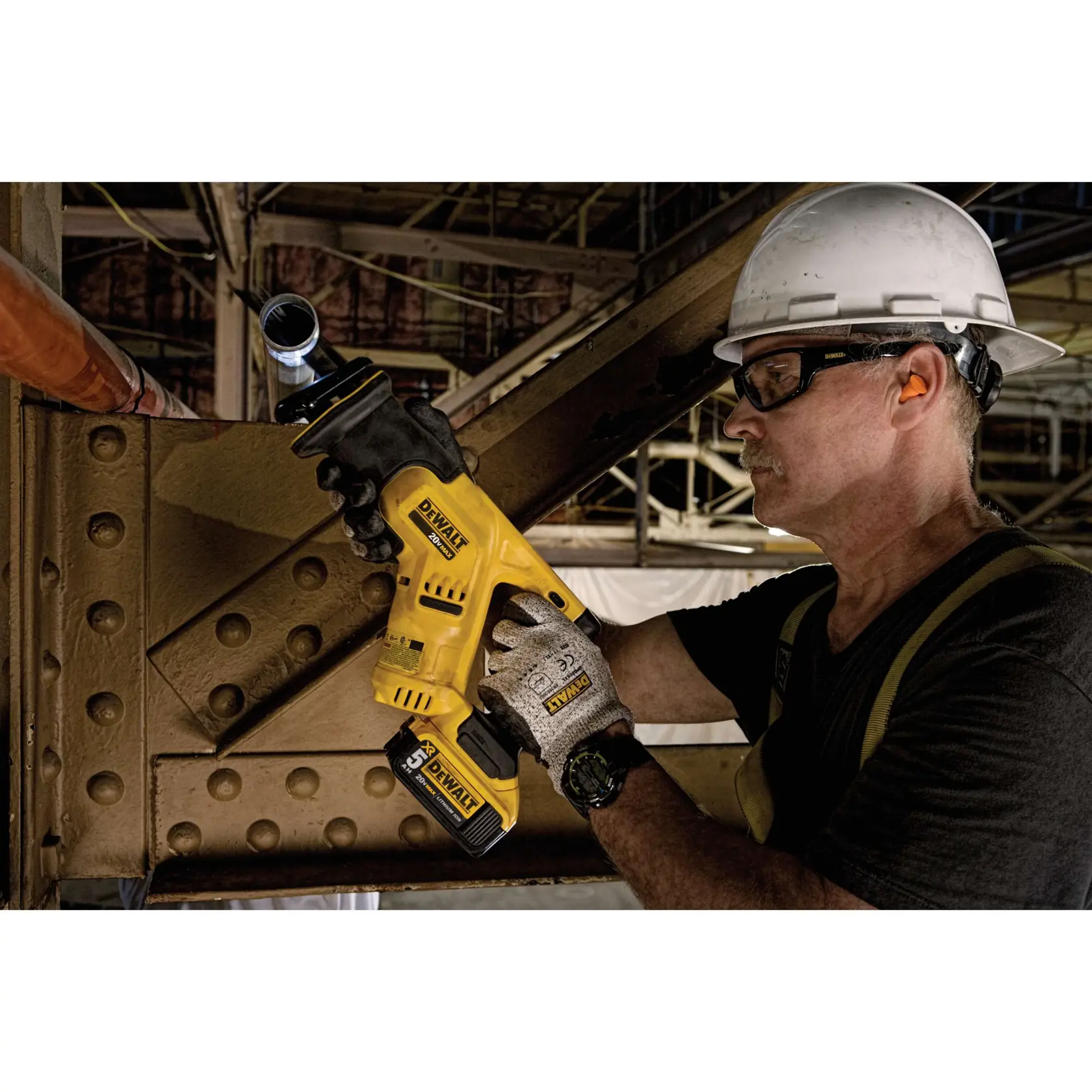 Compact Cordless Reciprocating Saw being used by worker to cut strut channel at worksite